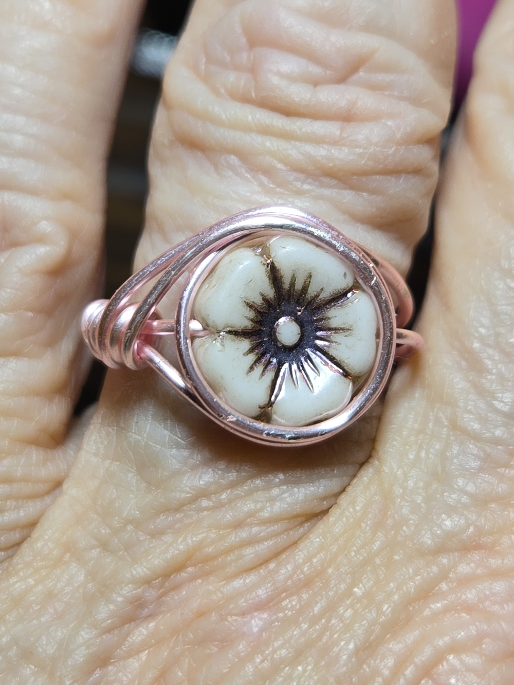 Handcrafted Ivory Blossom Flower Ring Asymmetrically Wrapped In Pink Wire